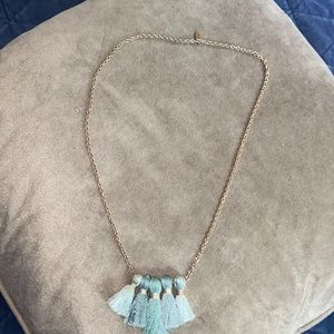 Gold chain blue/green fringe necklace.